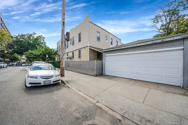 a car parked in front of a house