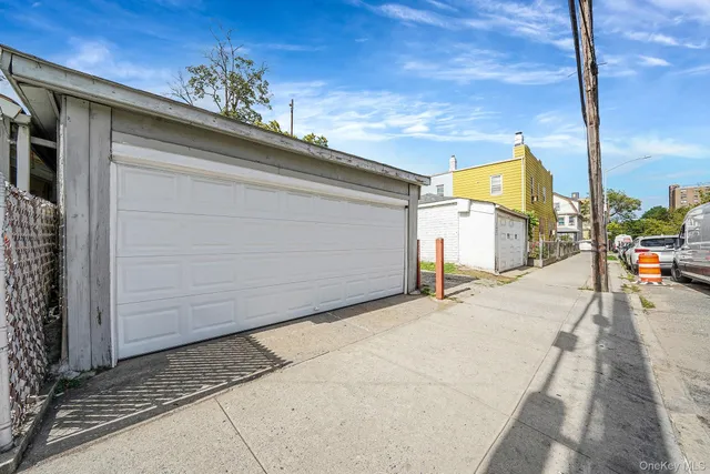 a view of a street with the building in the background