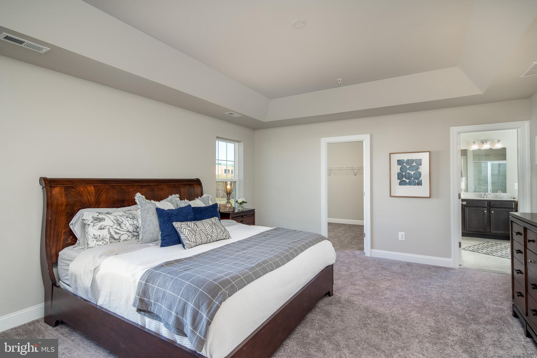 6444 Hanover Road Hanover, MD 21076 - Photo 5 of 29 a bedroom with a bed and furniture