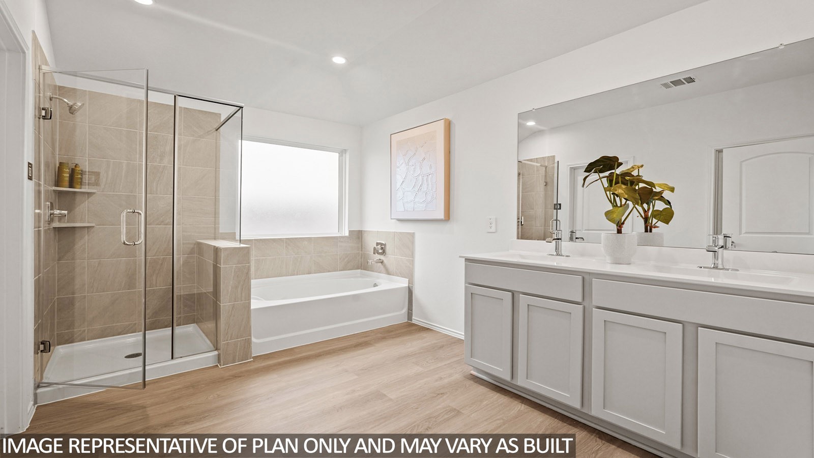 16819 Country Roots Avenue Conroe, TX 77302 - Photo 11 of 30 a bathroom with a tub sink and mirror