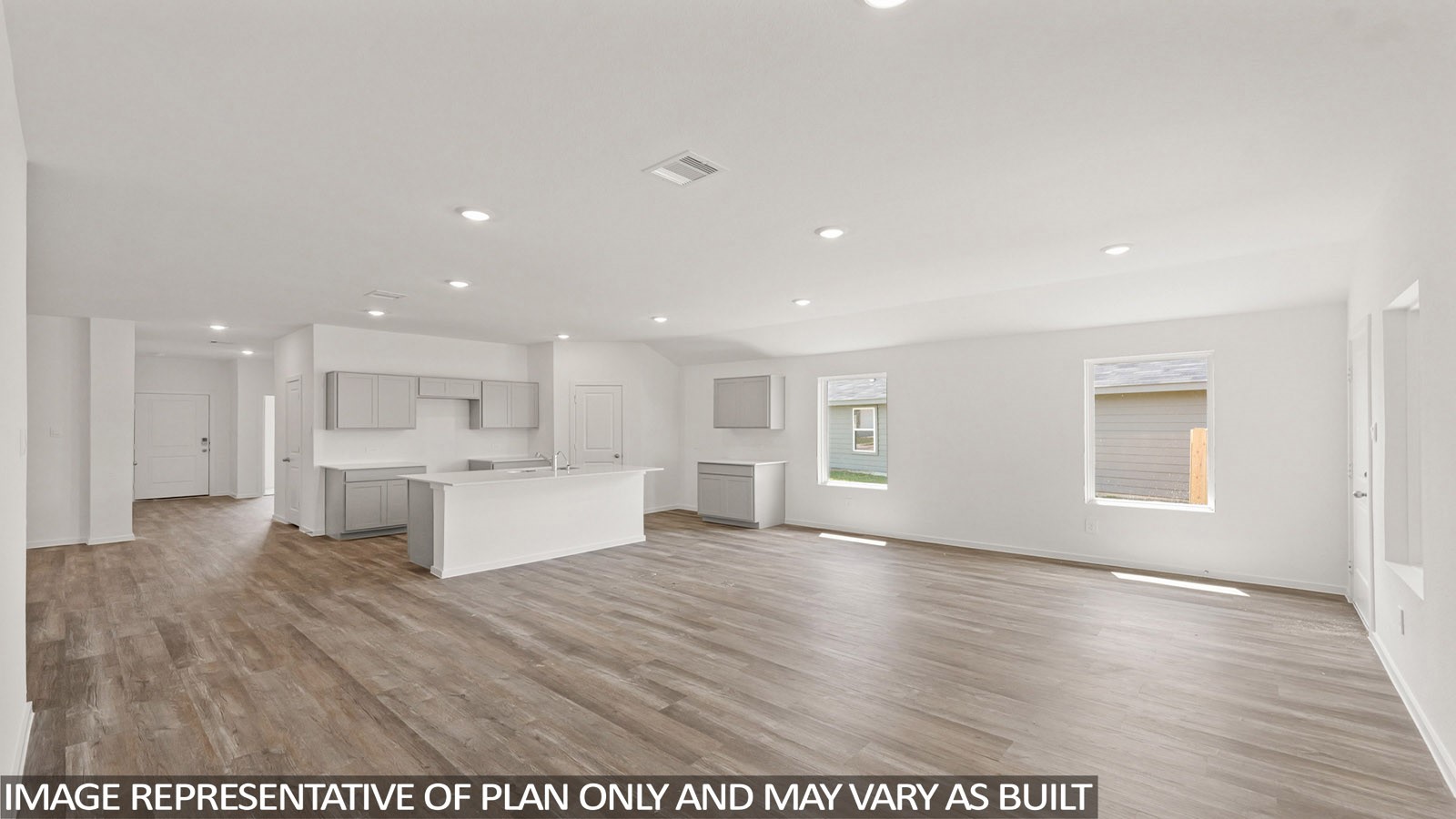 16819 Country Roots Avenue Conroe, TX 77302 - Photo 5 of 30 a view of kitchen with kitchen island stainless steel appliances wooden cabinets and window