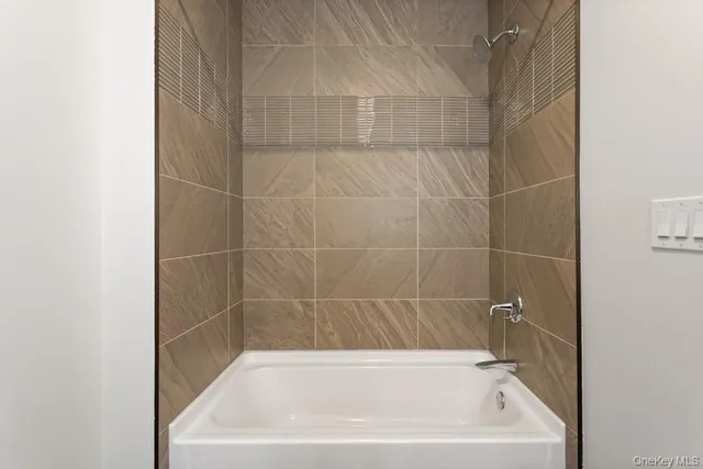 a bathroom with a bathtub