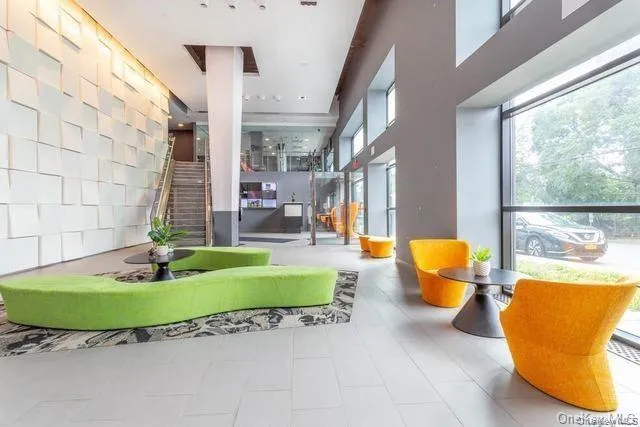 a view of a swimming pool with an outdoor seating