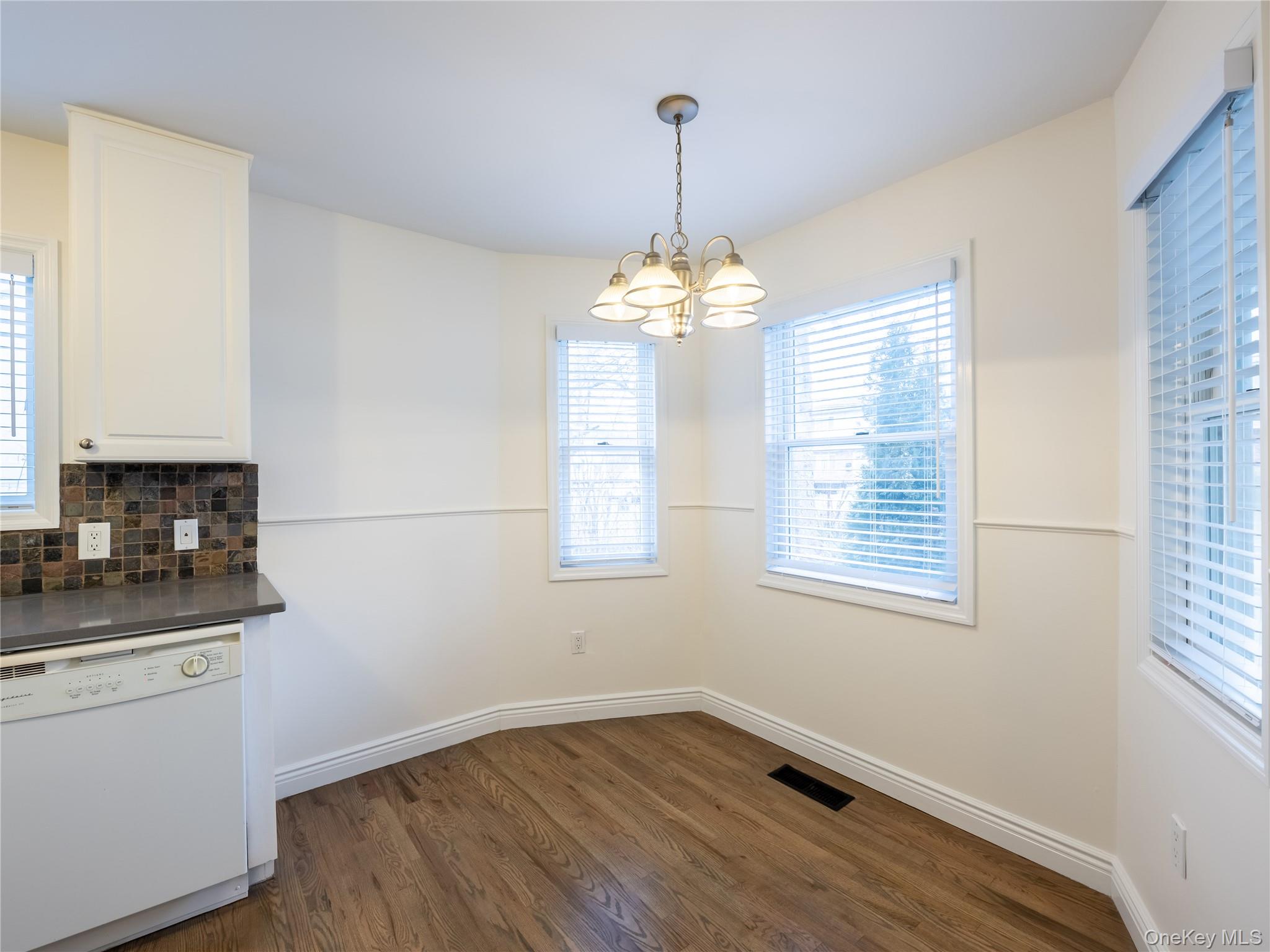 21 Marwood Road North Port Washington, NY 11050 - Photo 30 of 35 a room with window and ceiling fan
