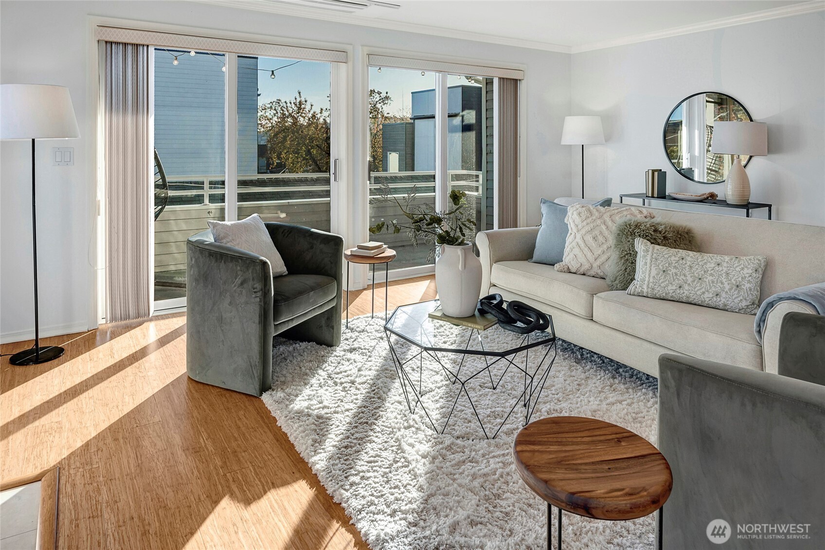 3621 Wallingford Avenue North, Unit 201 Seattle, WA 98103 - Photo 11 of 27 a living room with furniture and a large window