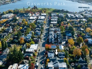 3621 Wallingford Avenue North, Unit 201 Seattle, WA 98103 - Photo 27 of 27 an aerial view of residential houses with outdoor space