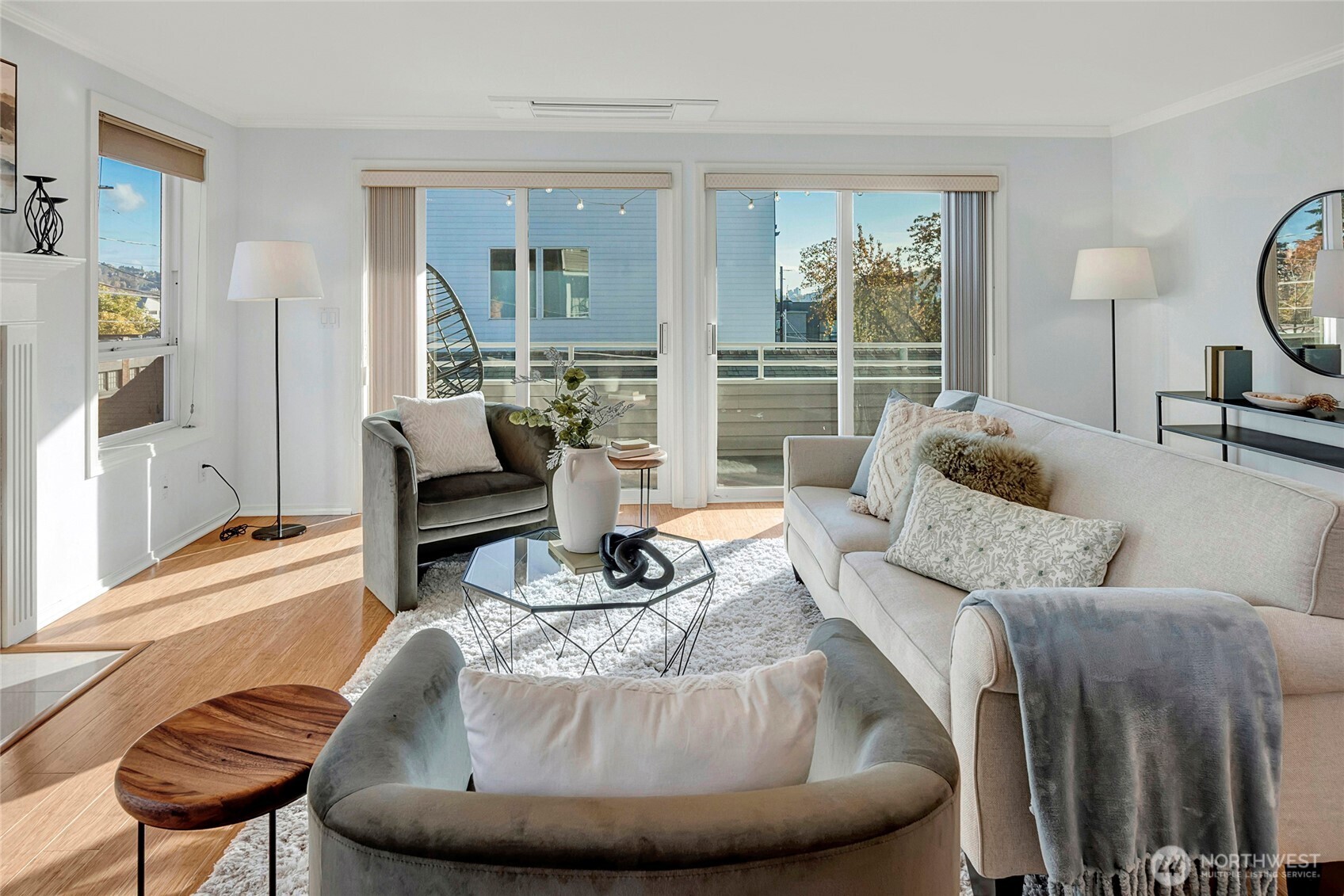 3621 Wallingford Avenue North, Unit 201 Seattle, WA 98103 - Photo 9 of 27 a living room with furniture and a large window