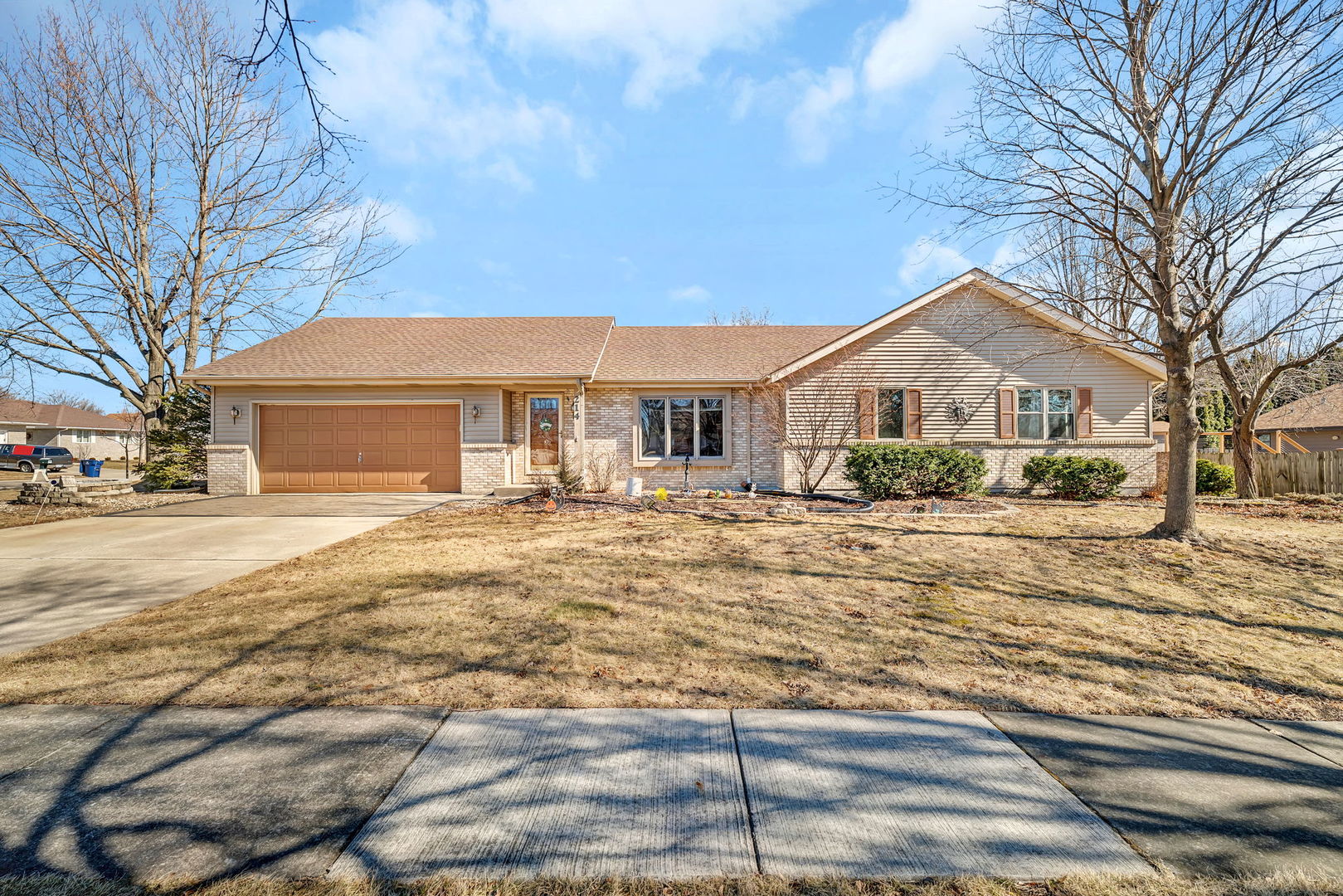 214 Deerpath Drive Minooka, IL 60447 - Photo 2 of 25 a front view of a house with a yard