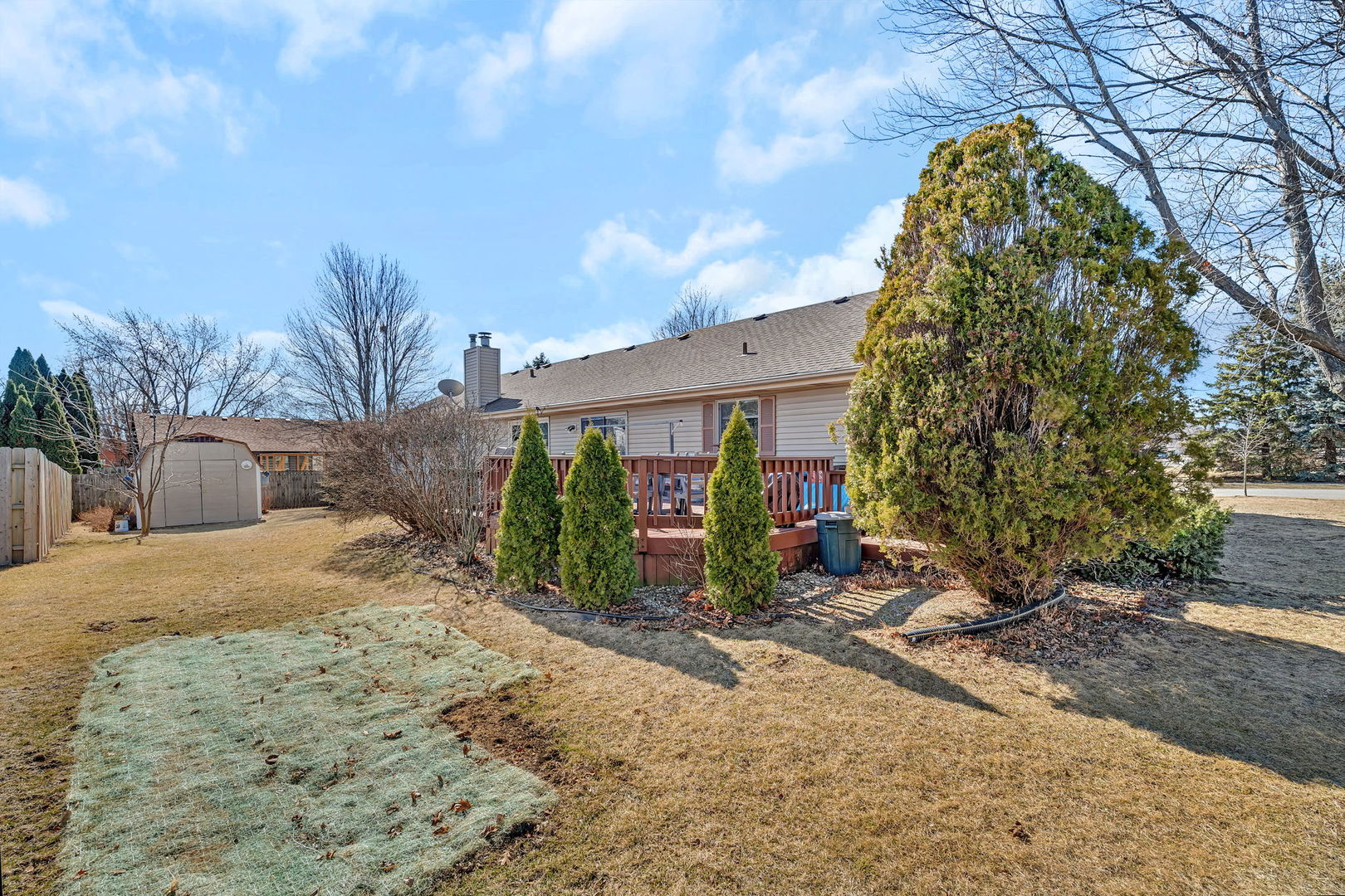 214 Deerpath Drive Minooka, IL 60447 - Photo 24 of 25 a view of a yard with potted plants