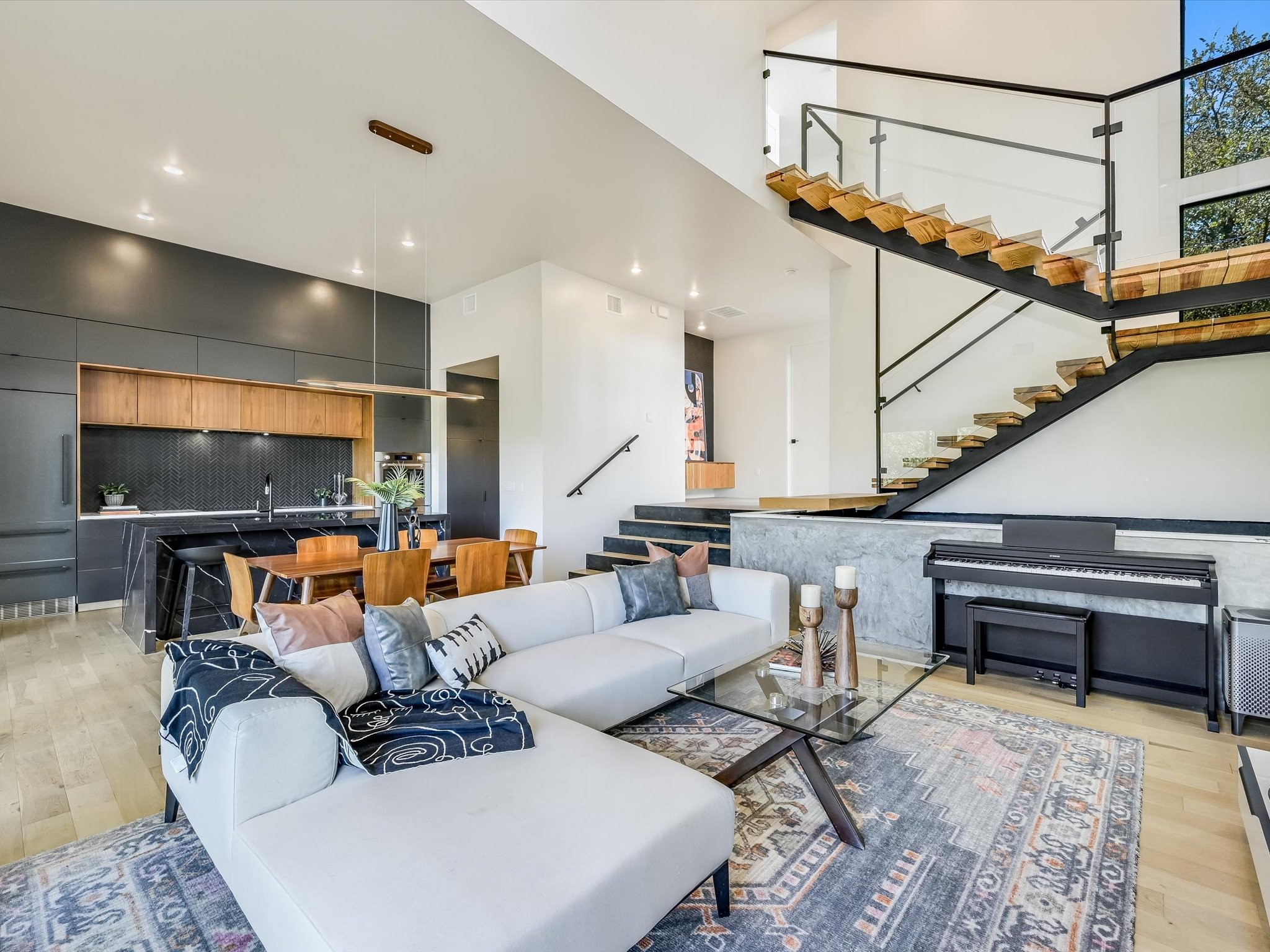 5203 Rob-Scott Street Austin, TX 78721 - Photo 1 of 1 a living room with furniture and a flat screen tv