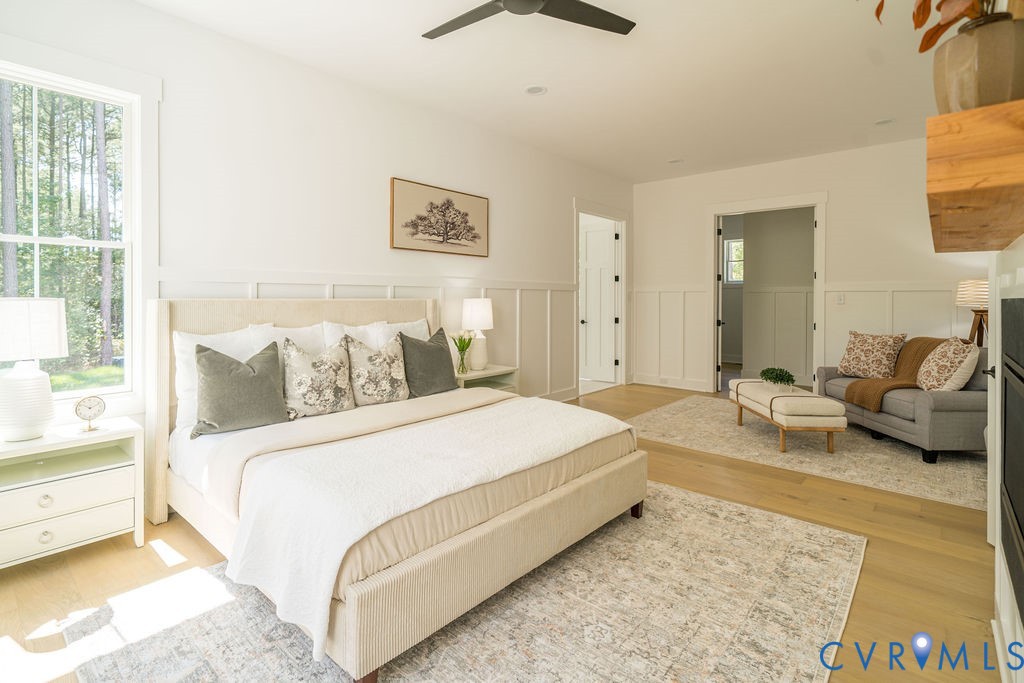 1175 Cardinal Crest Terrace Midlothian, VA 23113 - Photo 21 of 50 a spacious bedroom with a bed and a couch