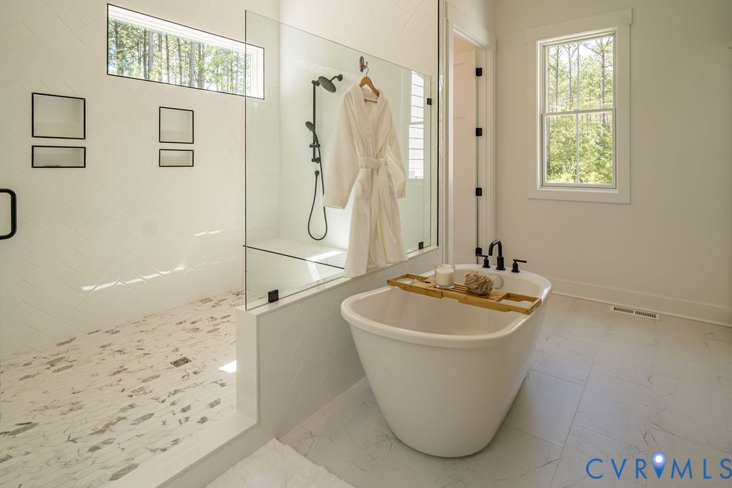 1175 Cardinal Crest Terrace Midlothian, VA 23113 - Photo 27 of 50 a bathroom with a bathtub and shower