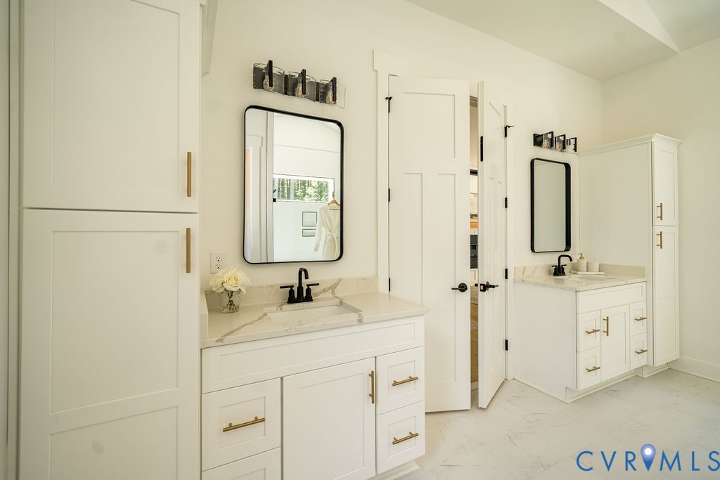 1175 Cardinal Crest Terrace Midlothian, VA 23113 - Photo 28 of 50 a bathroom with double vanity sink and a mirror