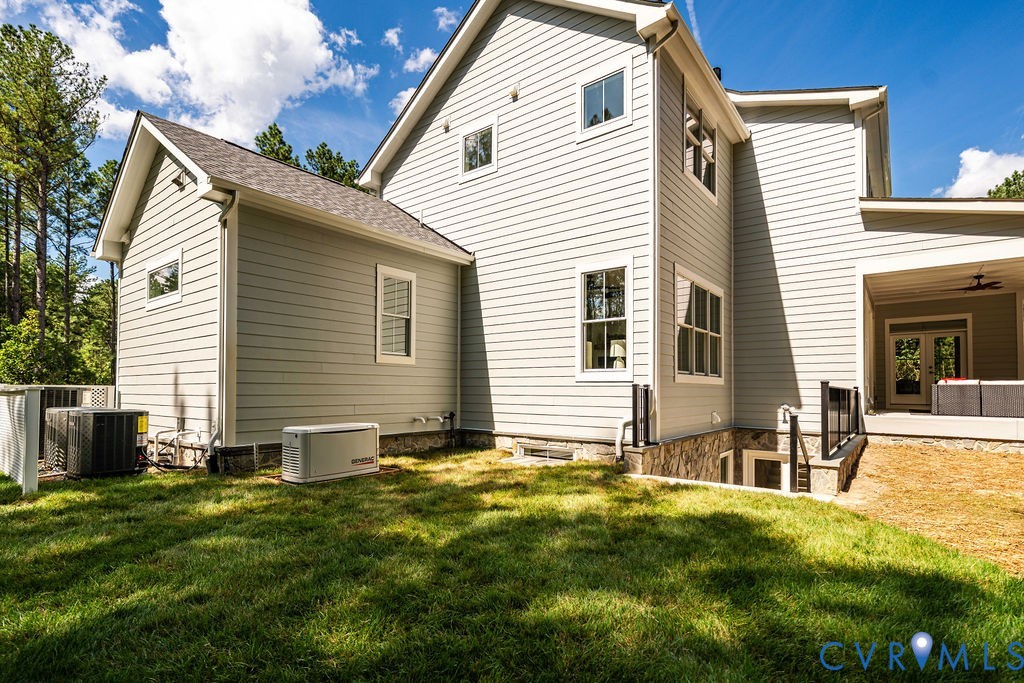 1175 Cardinal Crest Terrace Midlothian, VA 23113 - Photo 41 of 50 a backyard of a house with table and chairs