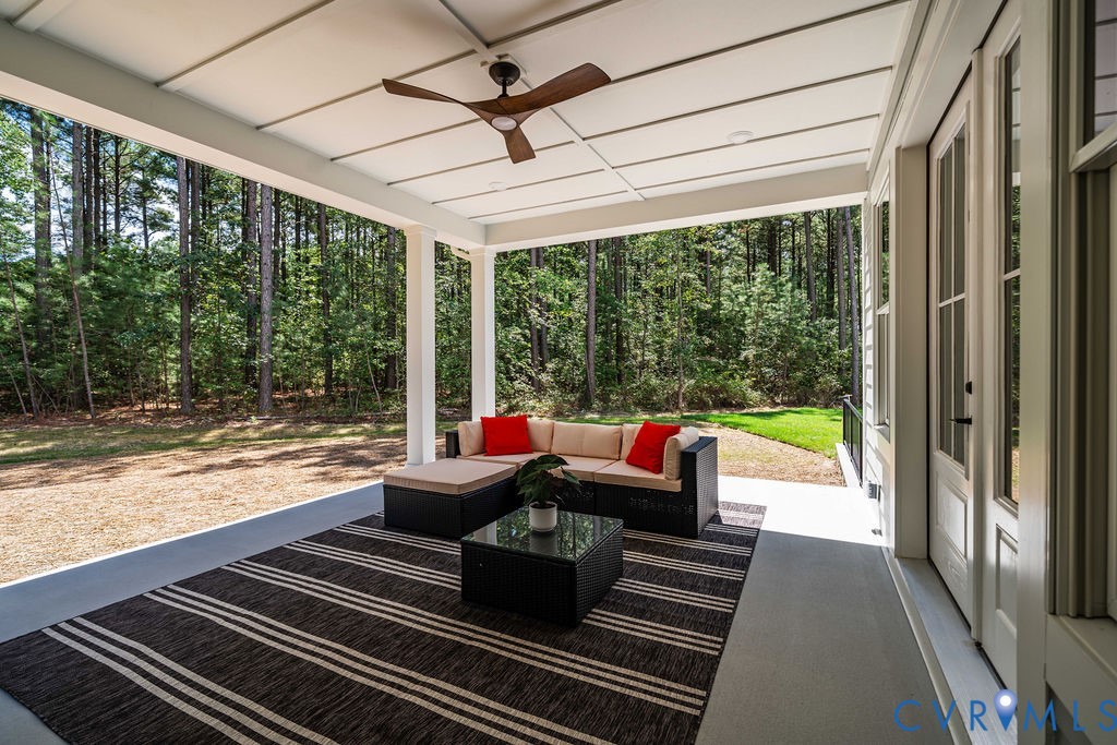 1175 Cardinal Crest Terrace Midlothian, VA 23113 - Photo 42 of 50 a view of a patio with lawn chairs floor to ceiling window with wooden floor