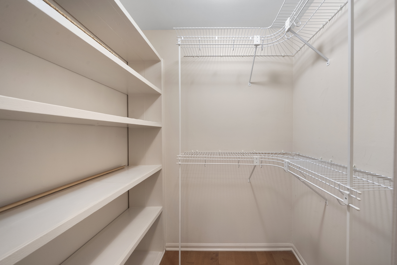 4949 Golf Road, Unit 101 Skokie, IL 60077 - Photo 16 of 22 a view of an empty walk in closet