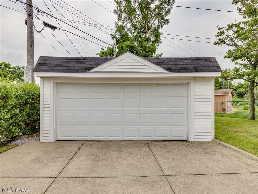 1535 Chelmsford Road Cleveland, OH 44124 - Photo 19 of 19 2.5 Car garage with newer door and opener. New man door installed on the side. This home is ready for it's new owner.