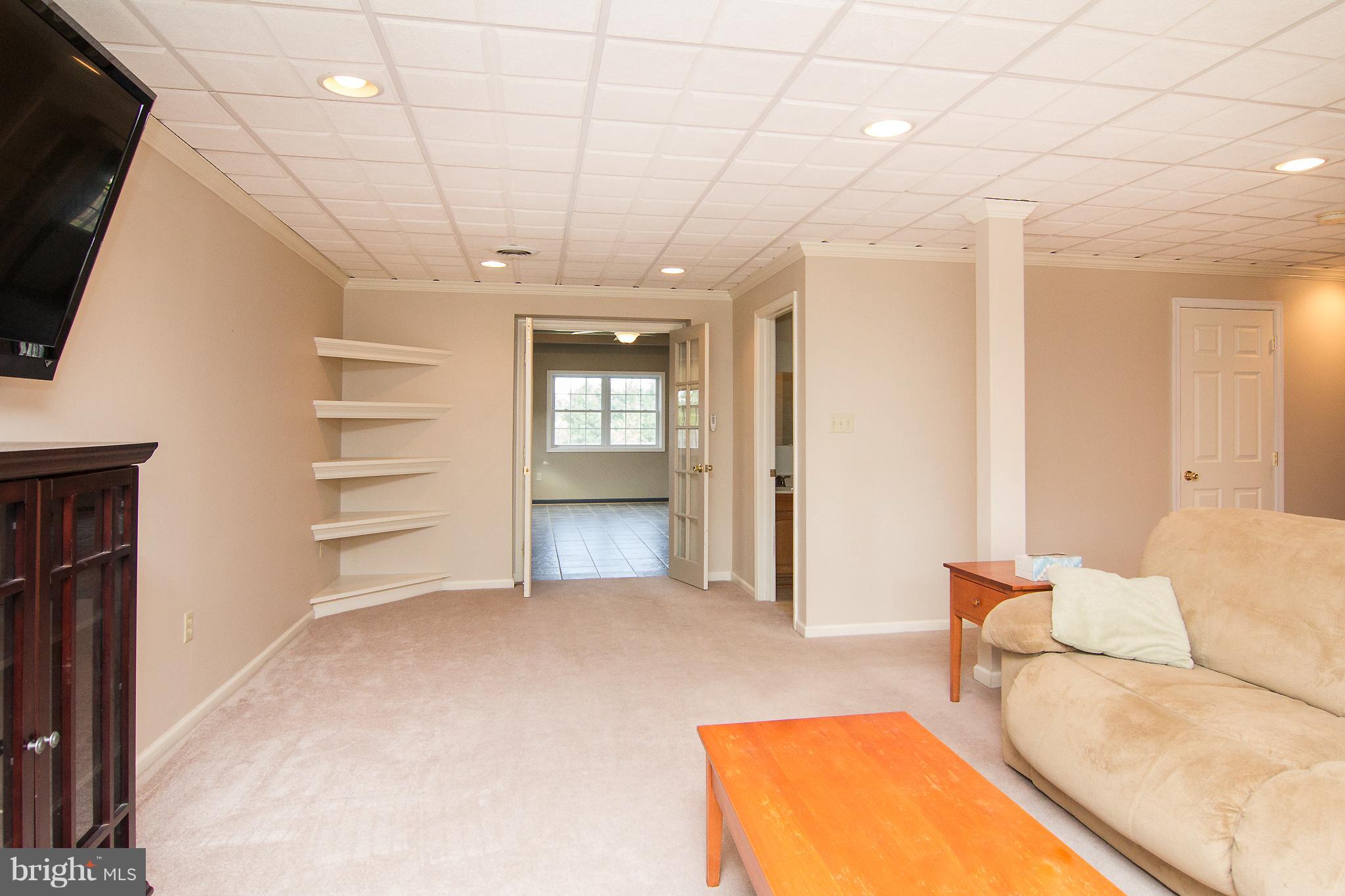 824 Lucabaugh Mill Road Westminster, MD 21157 - Photo 21 of 30 Family Room leads to rec room