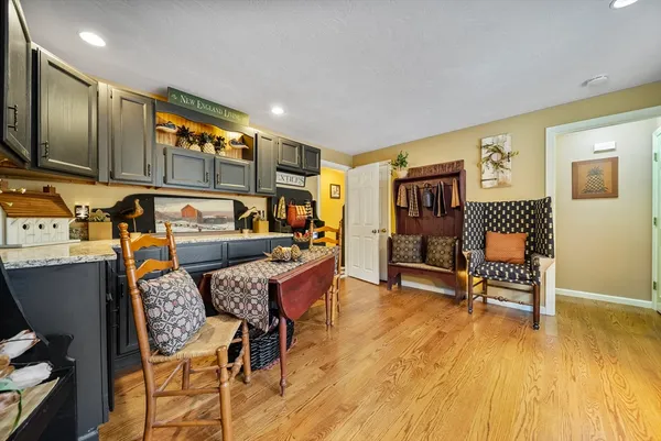 a bed room with furniture and a window