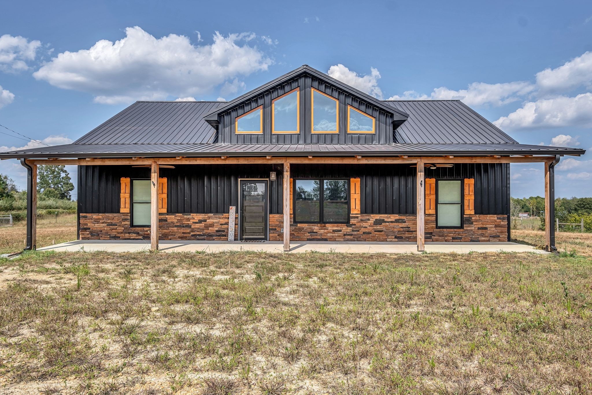 a front view of a house with porch