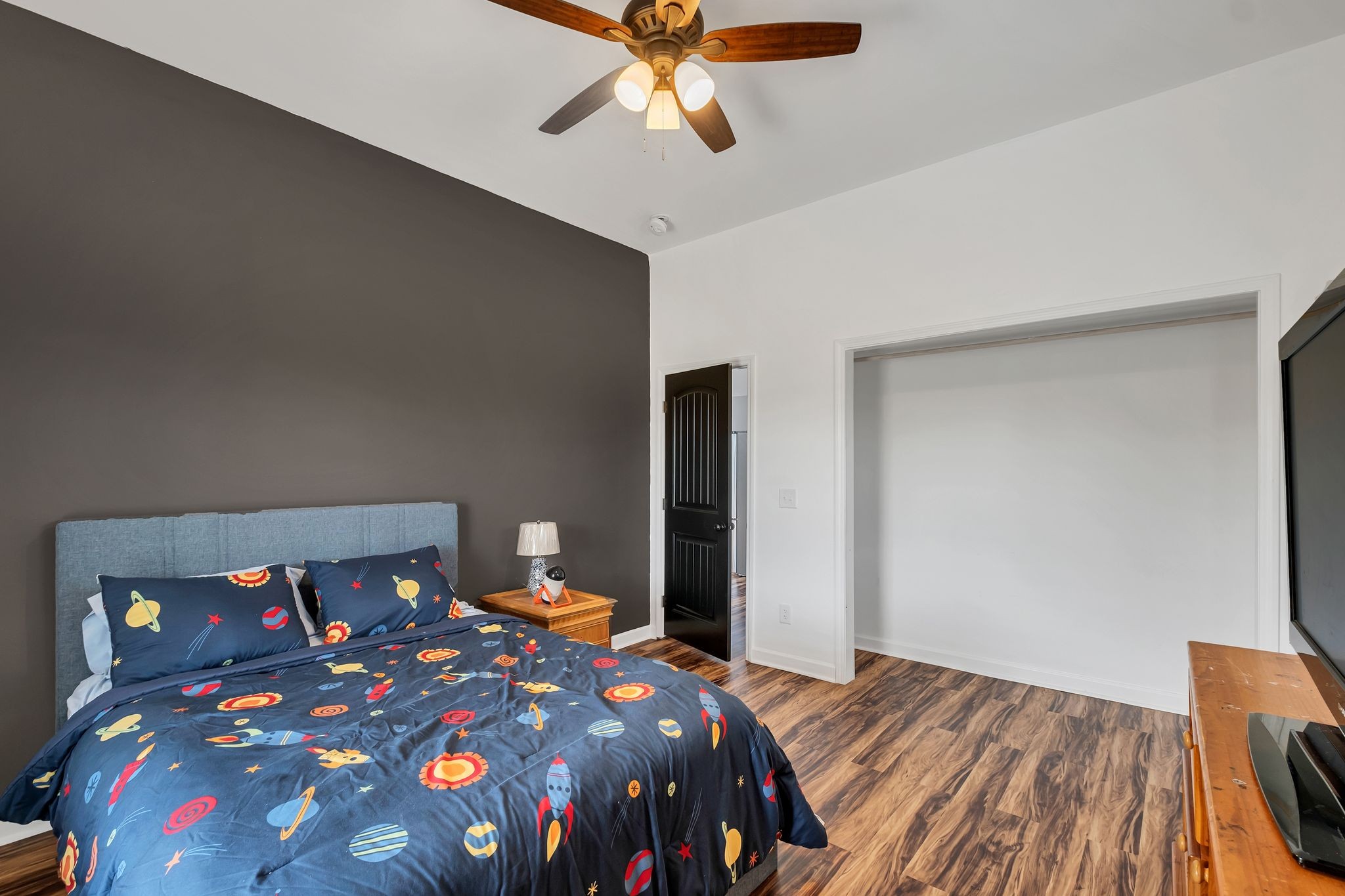 310 Christopher Lane Lawrenceburg, TN 38464 - Photo 22 of 50 a bedroom with a bed and wooden floor