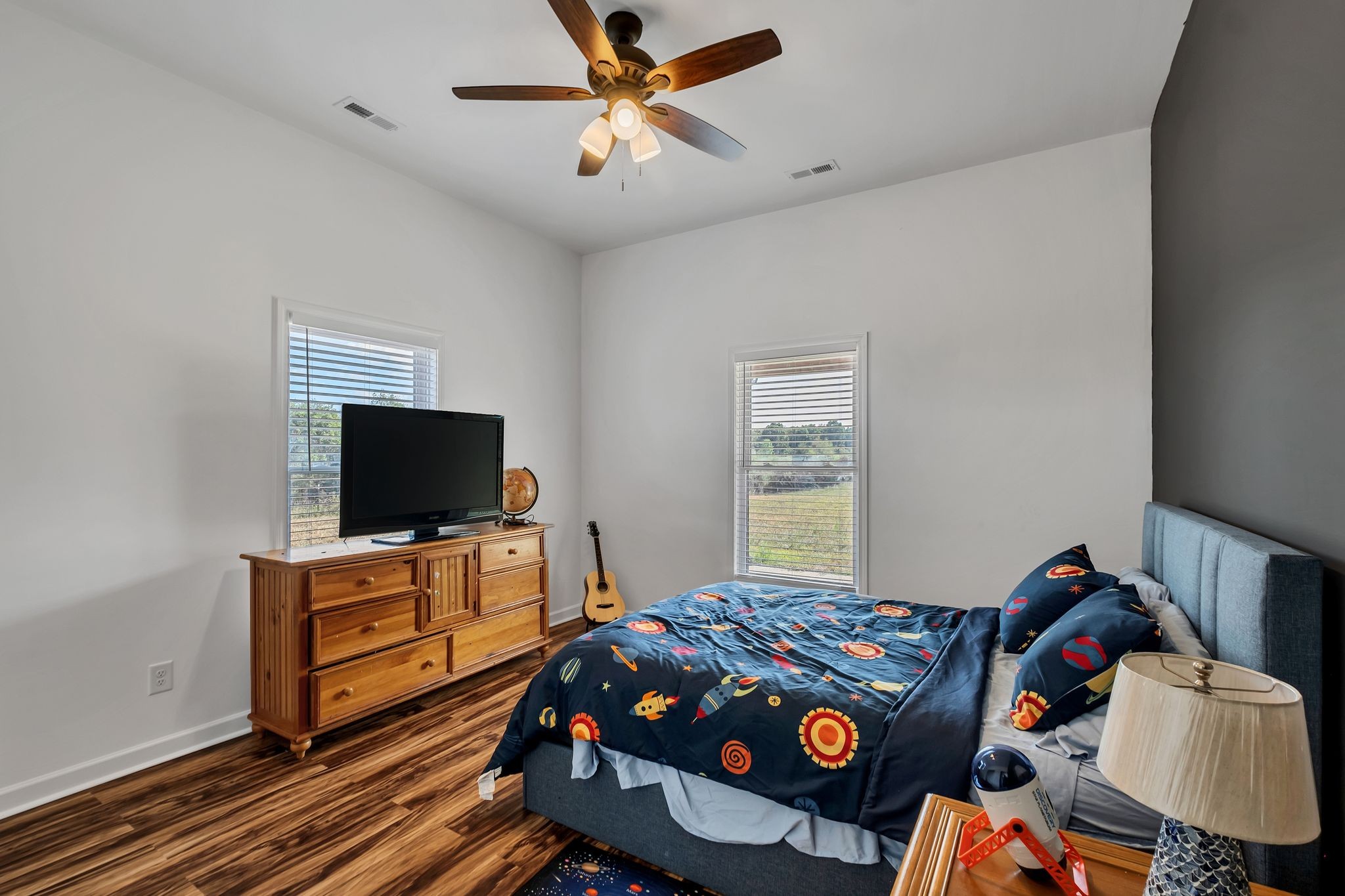 310 Christopher Lane Lawrenceburg, TN 38464 - Photo 23 of 50 a bedroom with a bed and a flat screen tv