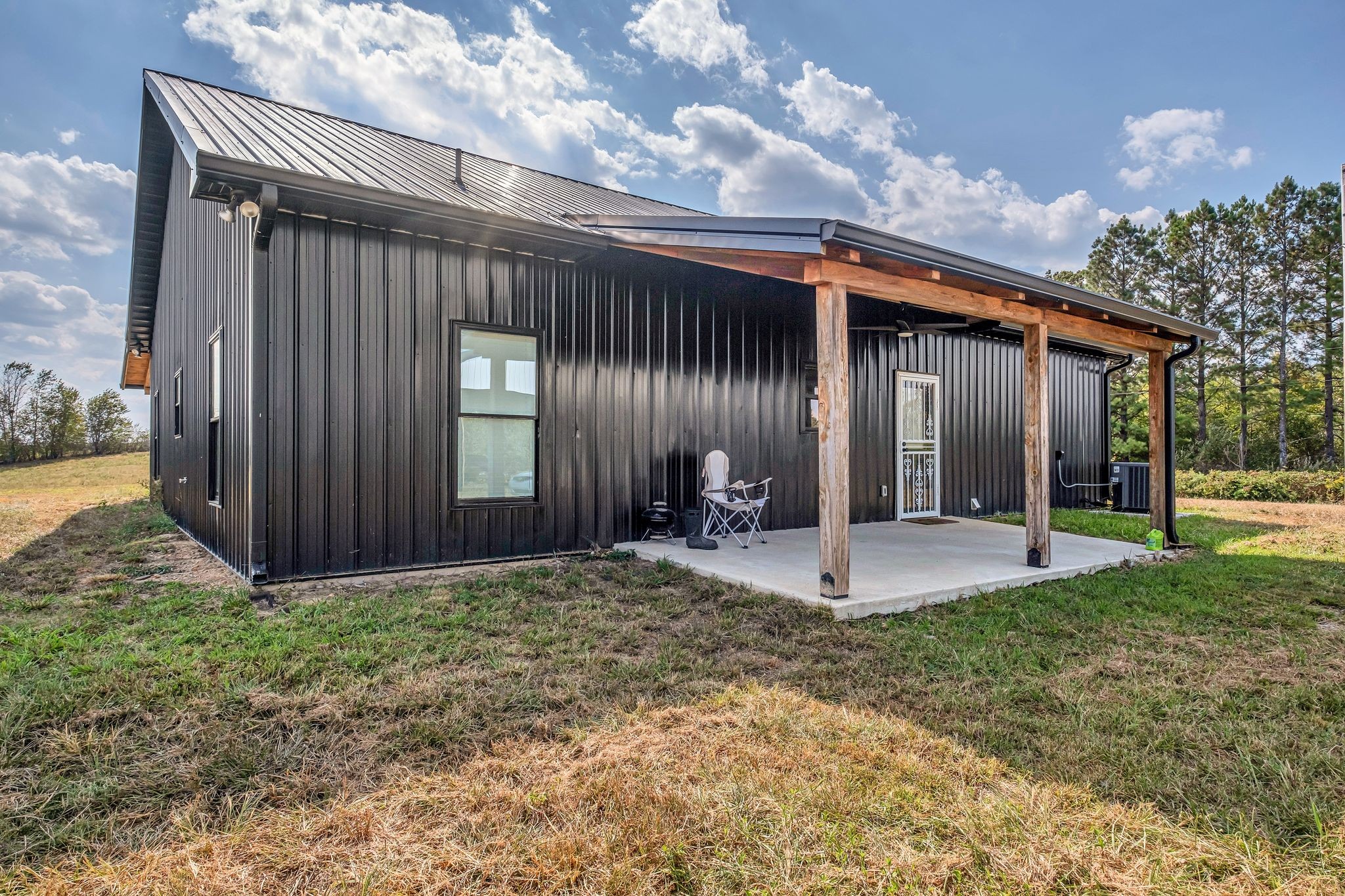 310 Christopher Lane Lawrenceburg, TN 38464 - Photo 29 of 50 a view of a house with backyard and porch