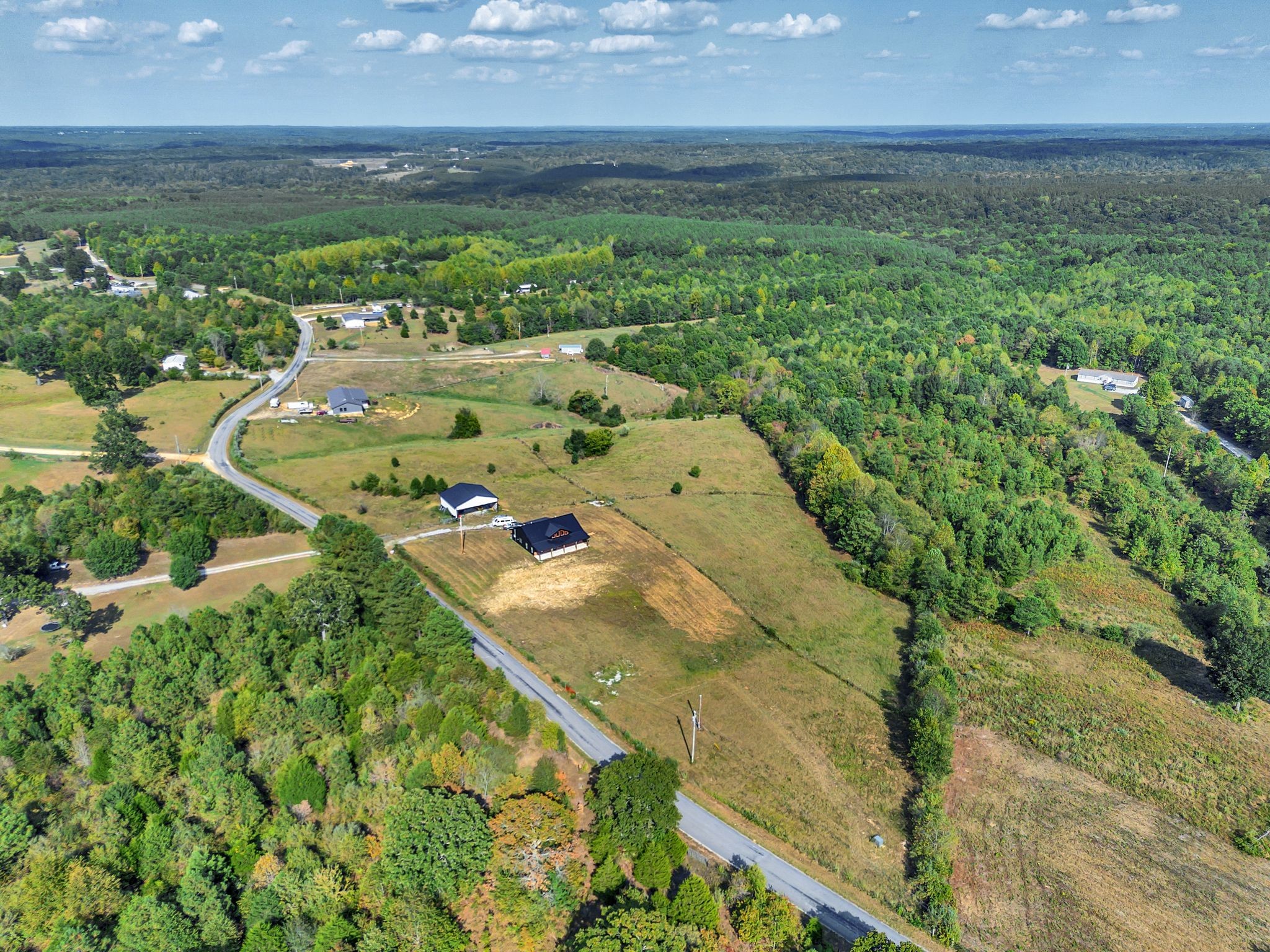310 Christopher Lane Lawrenceburg, TN 38464 - Photo 33 of 50 a view of a lake with a mountain