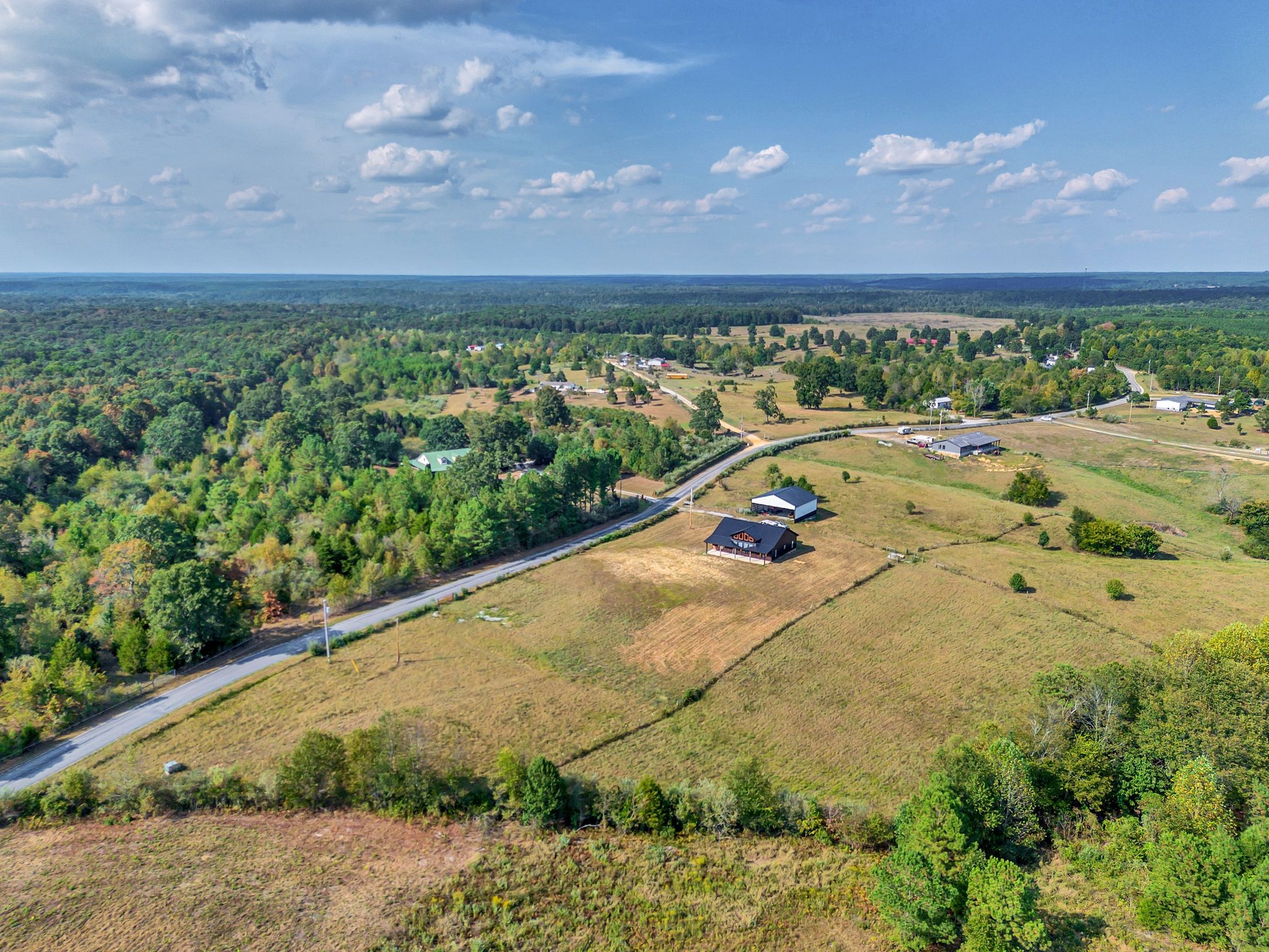 310 Christopher Lane Lawrenceburg, TN 38464 - Photo 35 of 50 a view of a yard with an outdoor space