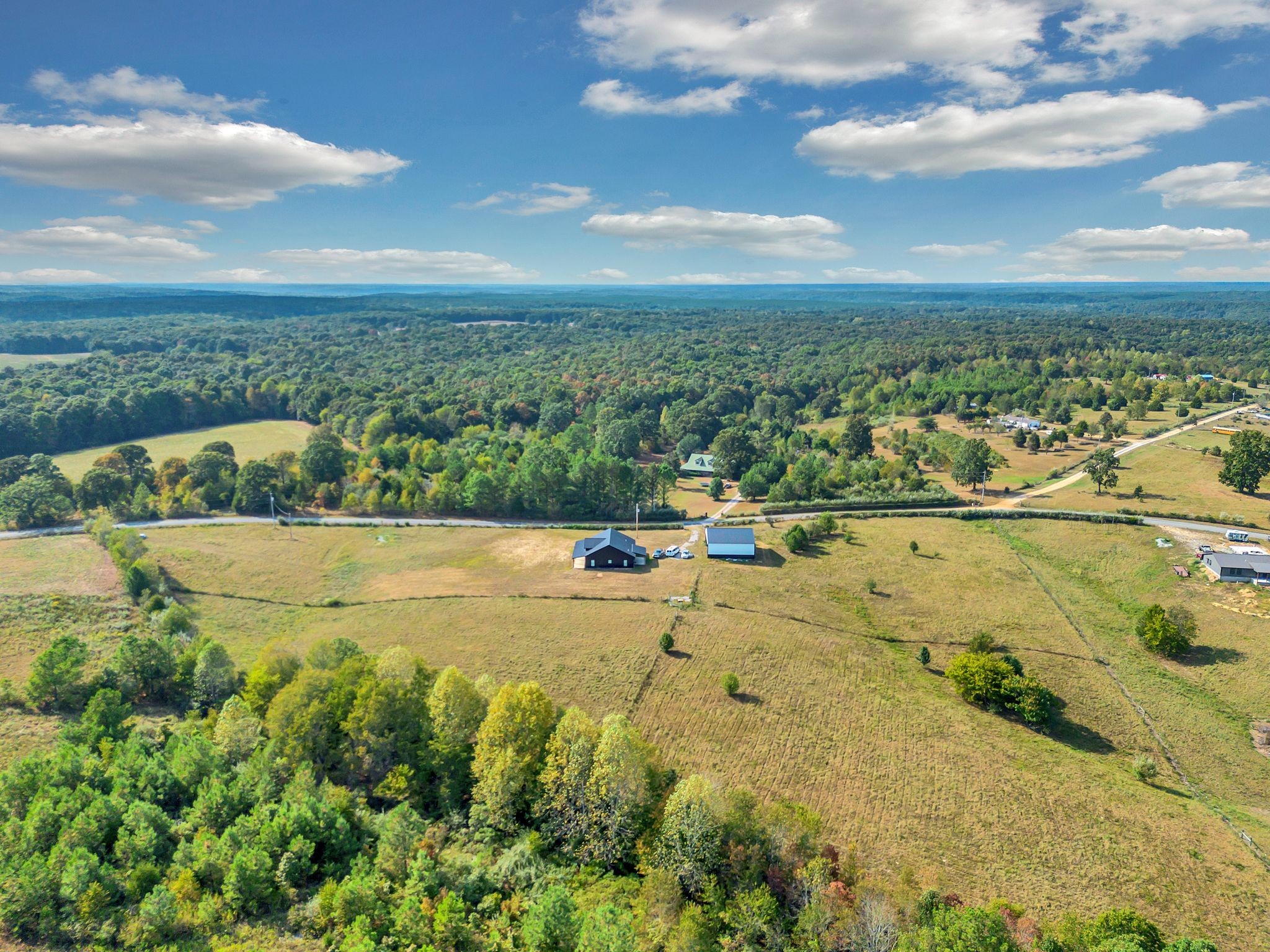 310 Christopher Lane Lawrenceburg, TN 38464 - Photo 37 of 50 a view of a yard with an outdoor space