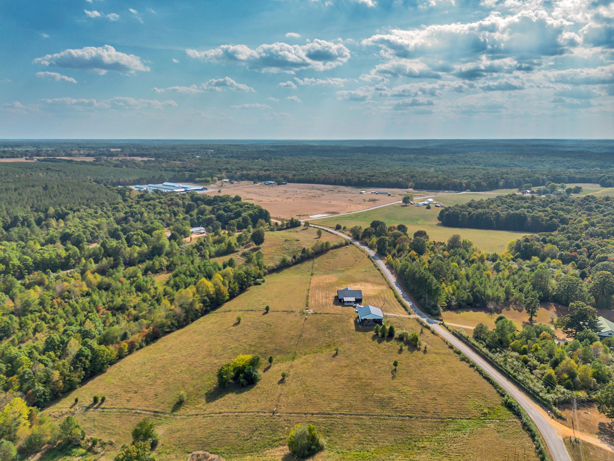 310 Christopher Lane Lawrenceburg, TN 38464 - Photo 40 of 50 a view of a swimming pool with a lake view