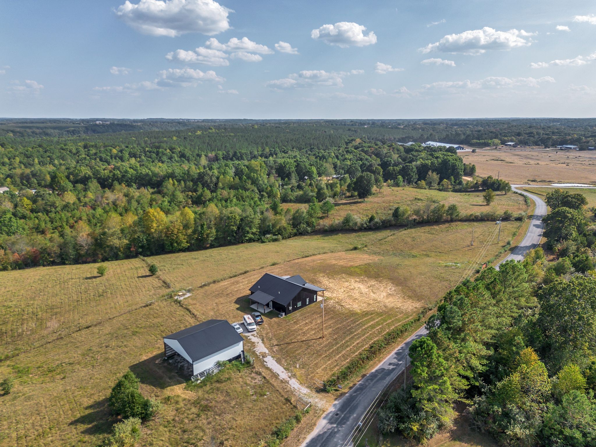 310 Christopher Lane Lawrenceburg, TN 38464 - Photo 42 of 50 an aerial view of residential houses with outdoor space