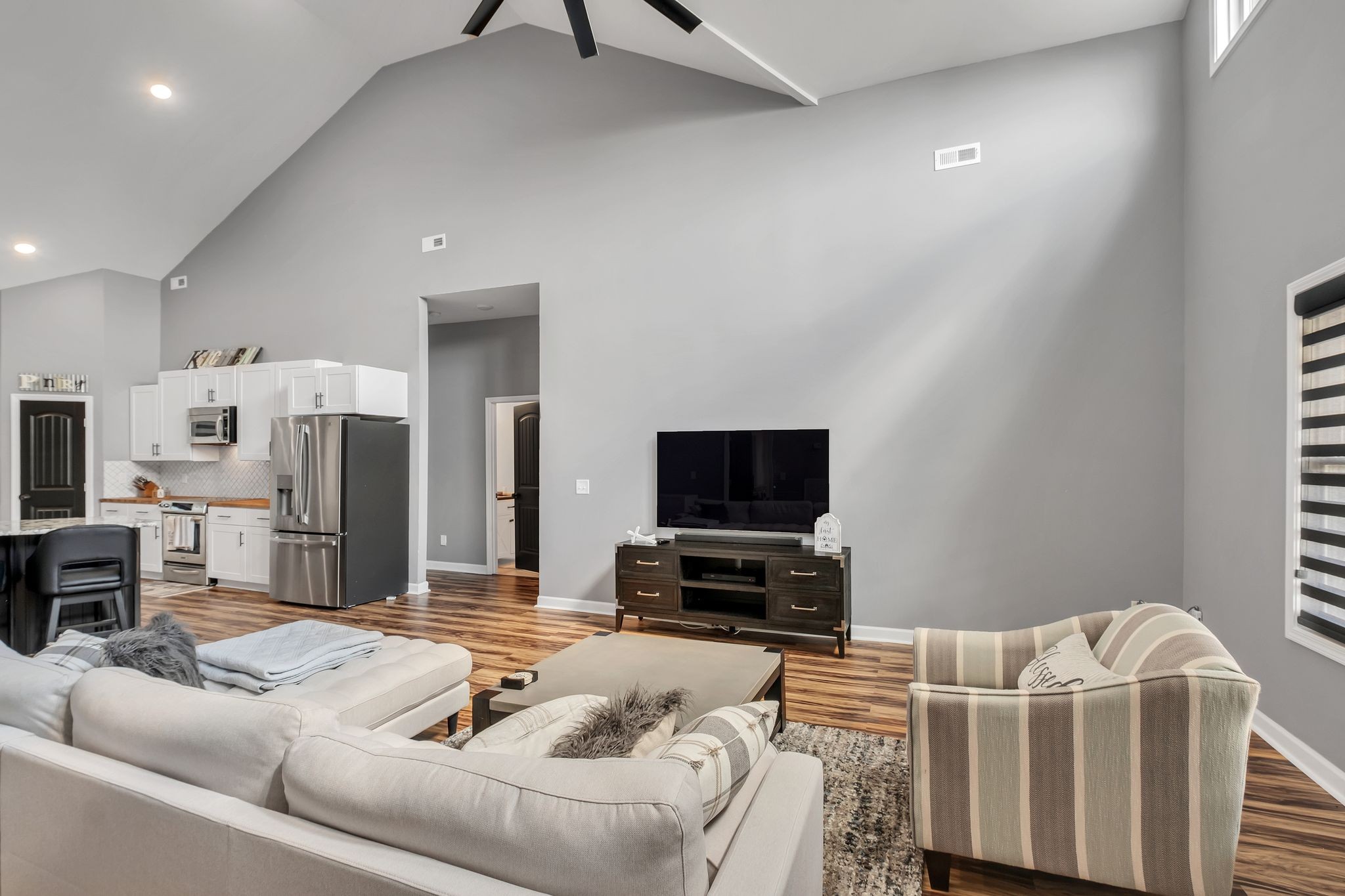 310 Christopher Lane Lawrenceburg, TN 38464 - Photo 7 of 50 a living room with furniture and a flat screen tv