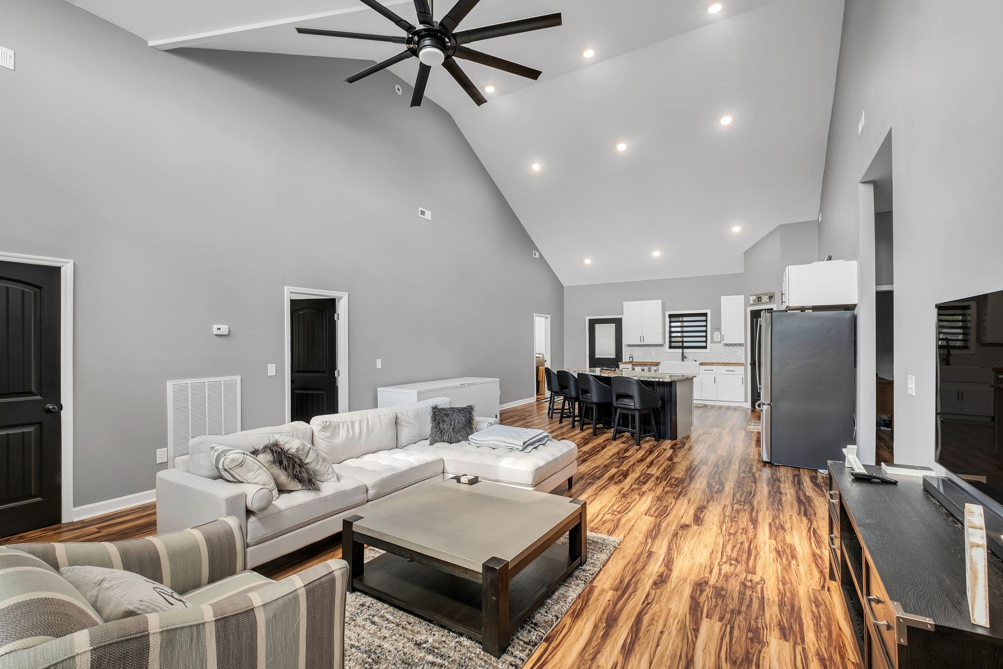 310 Christopher Lane Lawrenceburg, TN 38464 - Photo 8 of 50 a living room with furniture and a flat screen tv