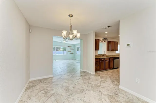 a view of a kitchen and a sink