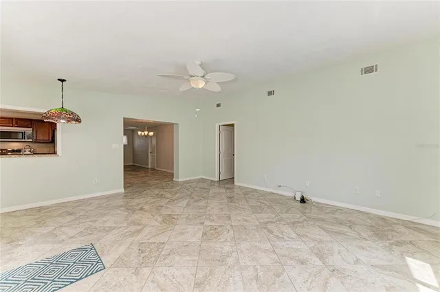 a view of a room with an empty space