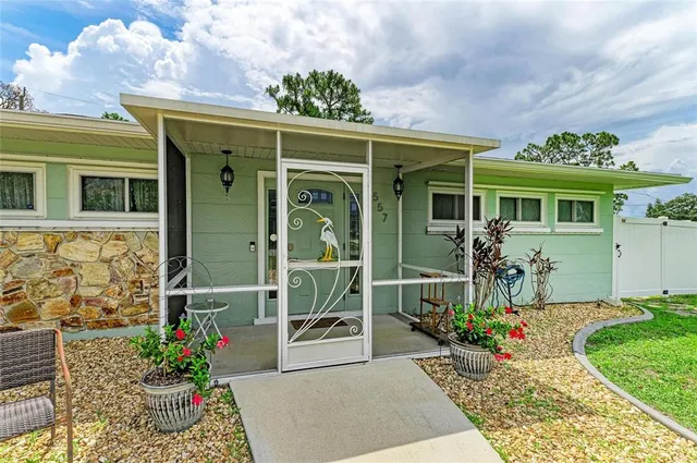 a front view of a house with a porch