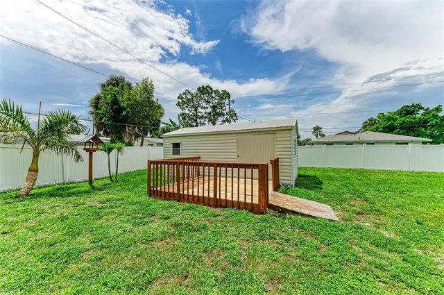 a view of a wooden fence
