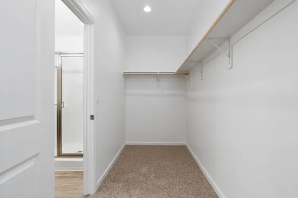 a view of garage with wooden floor