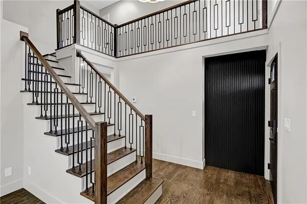 a view of entryway with wooden floor
