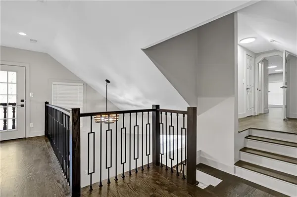 a view of a hallway with windows