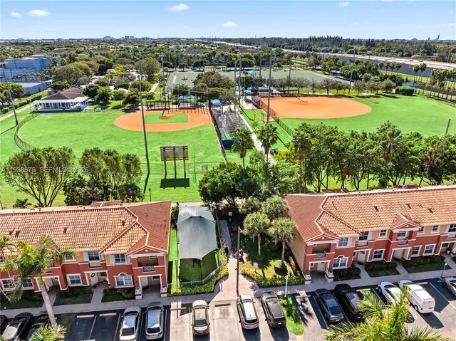 an aerial view of a city with lots of residential buildings