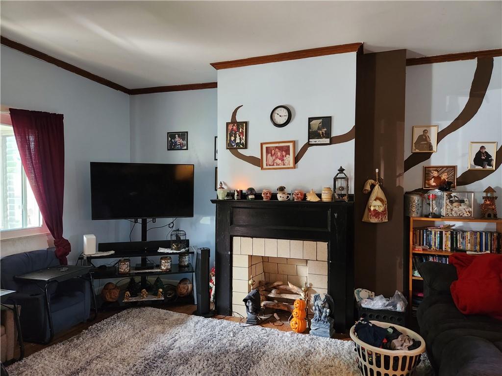 302 South Second Street Apollo, PA 15613 - Photo 3 of 15 a room with furniture and flat screen tv