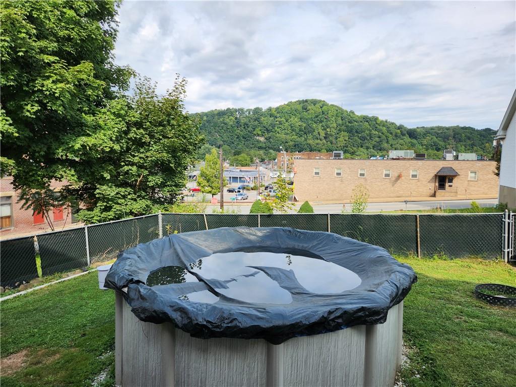 302 South Second Street Apollo, PA 15613 - Photo 5 of 15 a view of a swimming pool with a patio and a yard