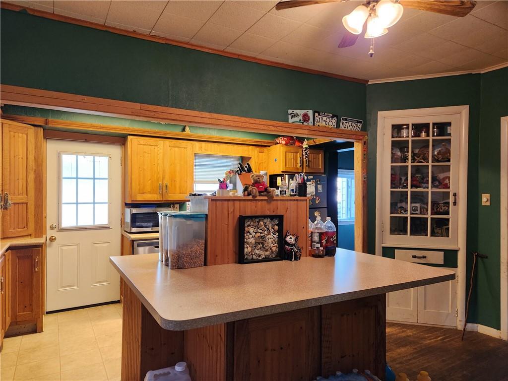 302 South Second Street Apollo, PA 15613 - Photo 7 of 15 a view of a dining room with furniture and chandelier