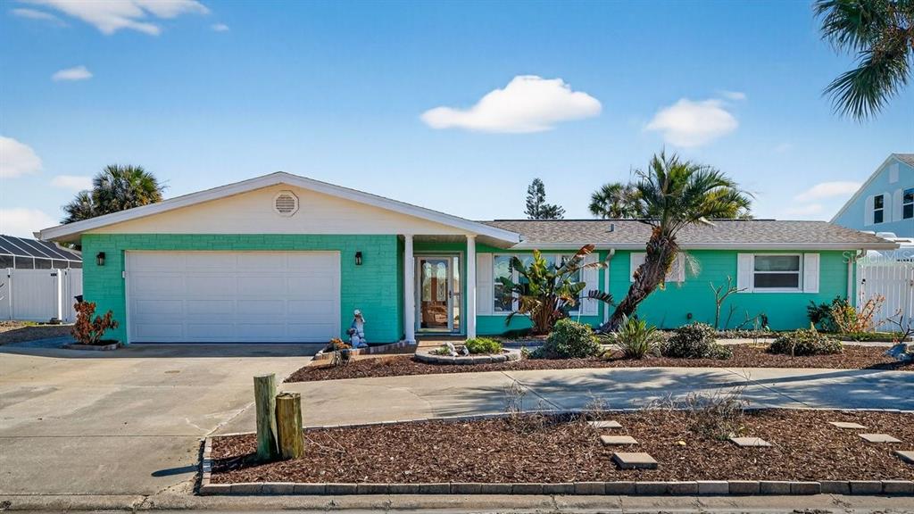 119 Carriage Ponce Inlet, FL 32127 - Photo 1 of 67 a front view of a house with garden
