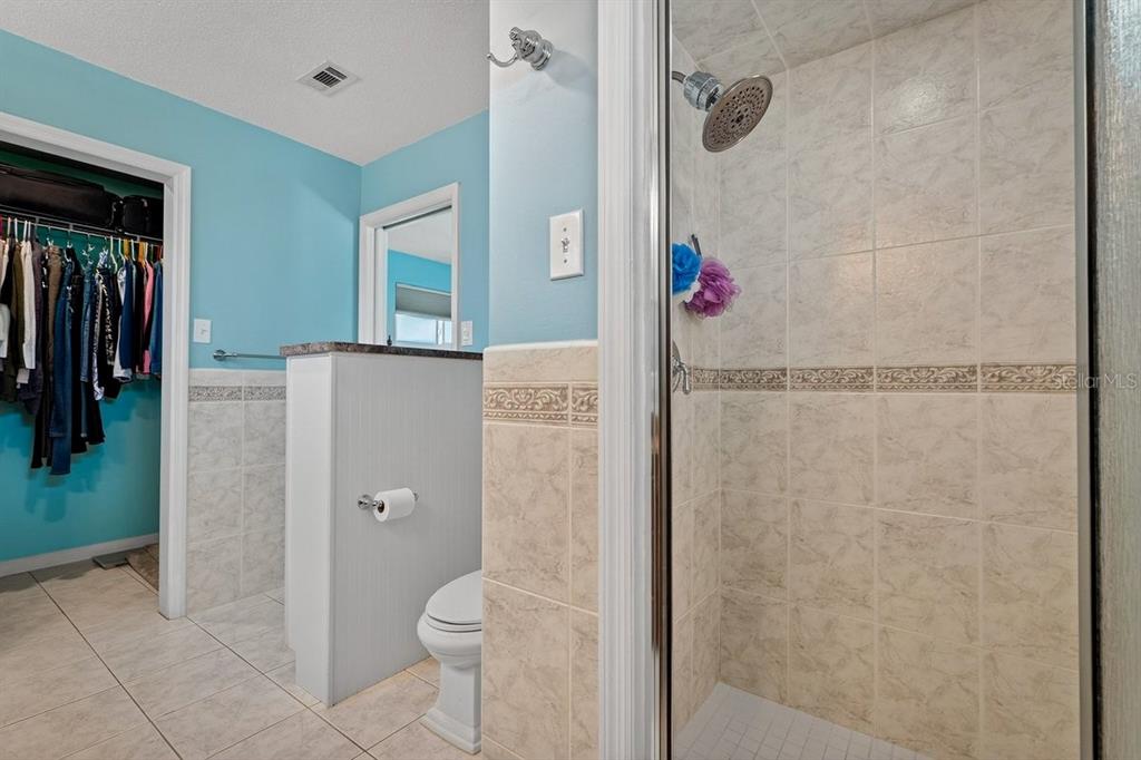 119 Carriage Ponce Inlet, FL 32127 - Photo 30 of 67 a bathroom with a shower and a toilet