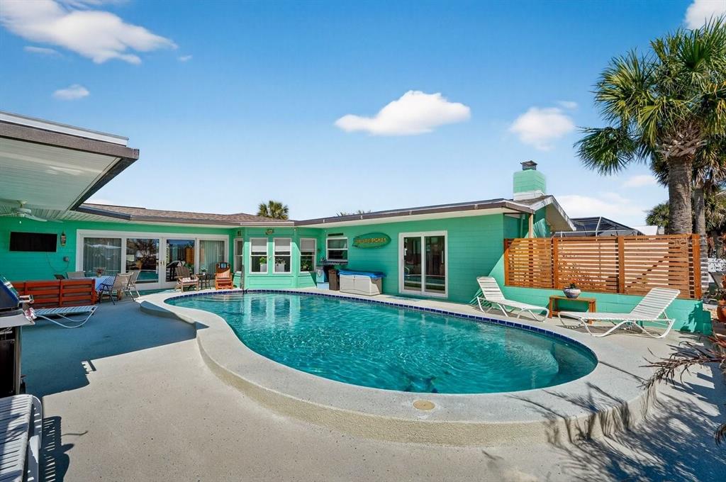 119 Carriage Ponce Inlet, FL 32127 - Photo 3 of 67 a view of a house with swimming pool and sitting area