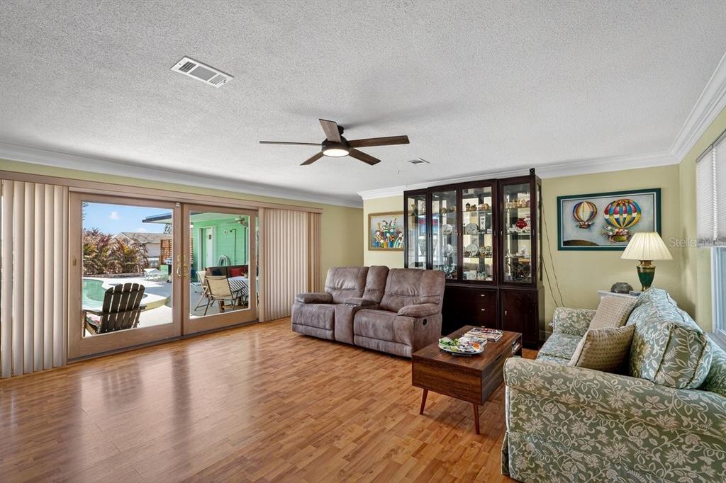 119 Carriage Ponce Inlet, FL 32127 - Photo 4 of 67 a living room with furniture and a large window