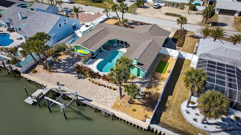 119 Carriage Ponce Inlet, FL 32127 - Photo 45 of 67 an aerial view of a swimming pool with outdoor seating